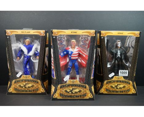 WWE / WWF Wrestling - Three boxed Mattel Defining Moments figures to include Sting x 2 (variants) and Ric Flair, all unopened