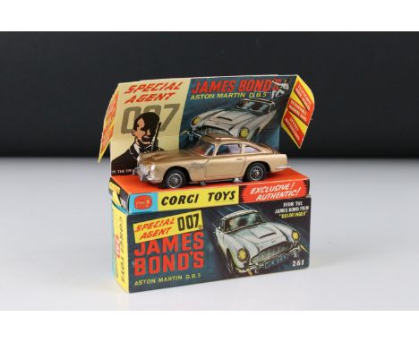 Boxed Corgi 261 James Bond Aston Martin DB5 diecast model with secret instructions, paper bag and 2 x ejector henchman figure