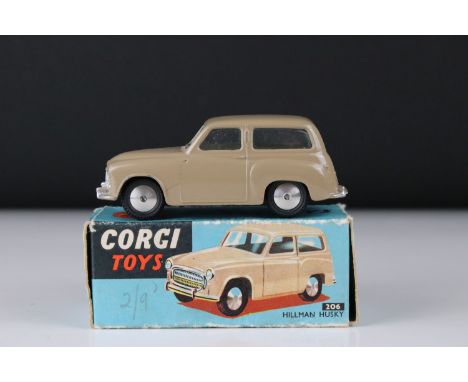 Boxed Corgi 206 Hillman Husky diecast model in tan, diecast ex with minimal paint chips to fender, gd box showing wear 