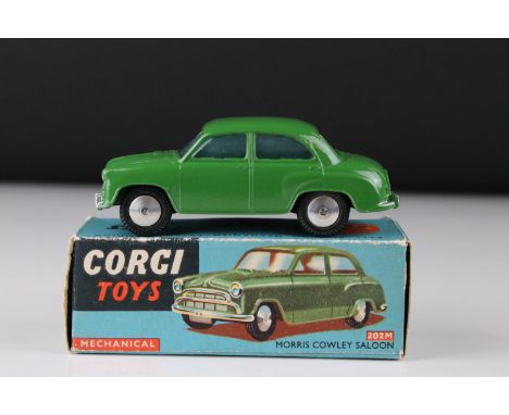 Boxed Corgi 202M Mechanical Morris Cowley Saloon diecast model in green, with Corgi brochure, diecast ex, box fair-gd with so