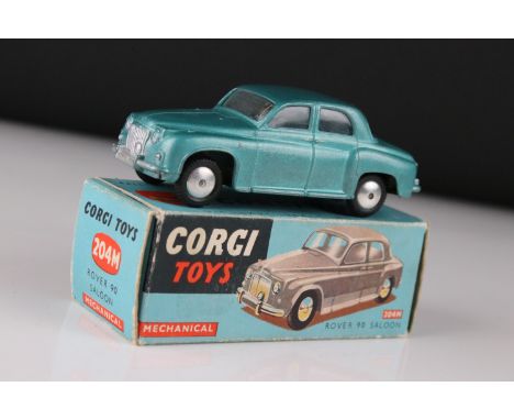 Boxed Corgi 204M Mechanical Rover 90 Saloon diecast model in metallic blue, diecast vg with small mark to bonnet, box gd with