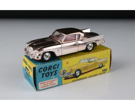 Boxed Corgi 211S Studebaker Golden Hawk diecast model in golden wash vacuum plated finish, white flash to rear, red interior,