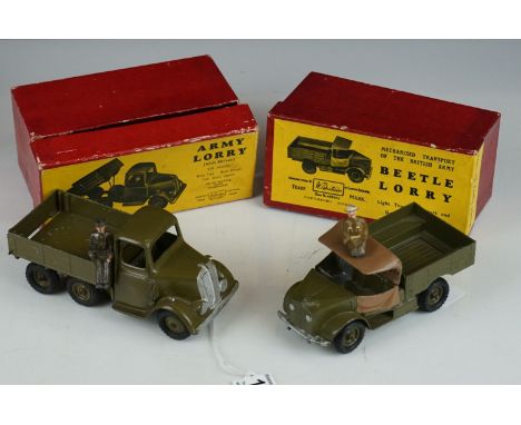 Two boxed Britains military diecast models to include 1335 Army Lorry (door loose) and 1877 Beetle Lorry, both with driver, s