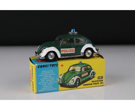 Boxed Corgi 492 Volkswagen European Police Car diecast model, diecast excellent with small paint chip to fender &amp; wear to