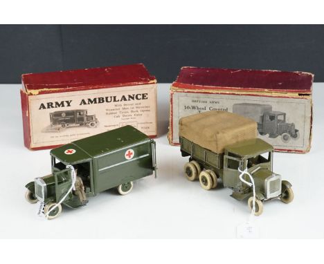 Two boxed Britains military models to include 1512 Army Ambulance with driver, wounded man and stretcher (back door hinge loo