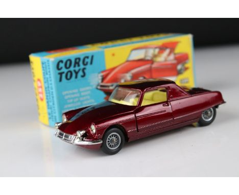 Boxed Corgi 259 Le Dandy Coupe Henri Chapron Body on Citroen DS Chassis diecast model in metallic maroon with yellow interior