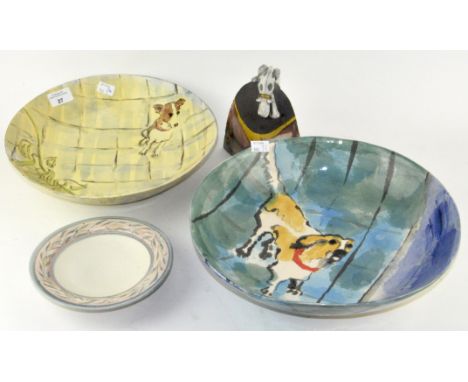 Two contemporary bowls, painted with dogs, largest 34cm diameter; together with two other ceramic items