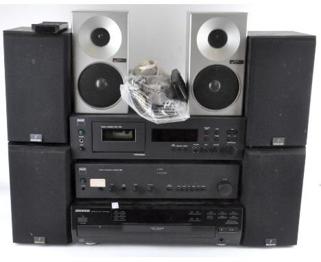 A collection of music equipment, including NAD stereo cassette deck 613, Kenwood CD player, Technic speakers and other items