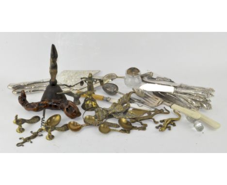 A collection of assorted metalware, including silver plated flatware, deer foot handled bell, brass items 