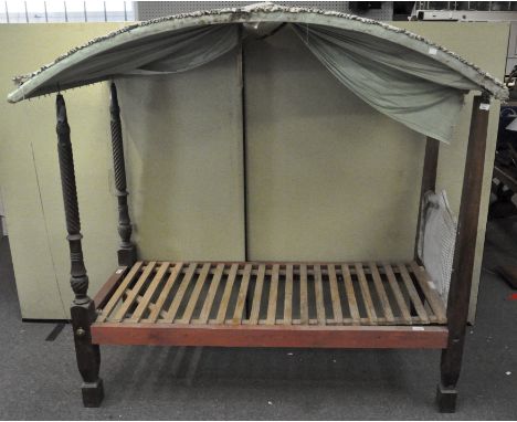 A vintage single four poster bed with wooden slats and worn headboard; together with a non-matching canopy, 183cm x 76cm