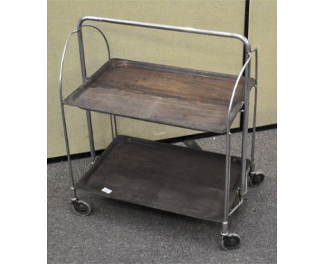 A vintage chrome folding tea trolley, 77cm high
