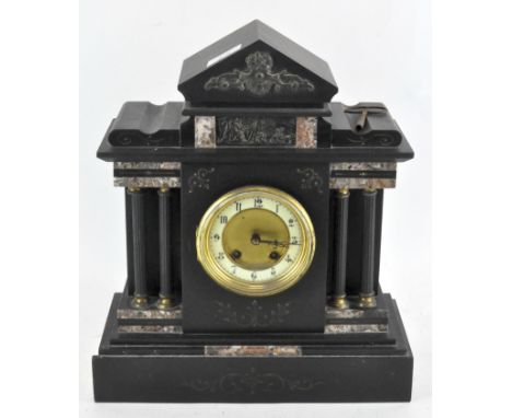 A large 19th century slate mantel clock, with marble inlay, the enamel ring dial with Arabic numerals denoting hours, 39cm hi