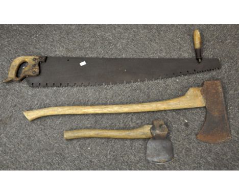 A saw, hatchet and axe, the saw being 102cm long