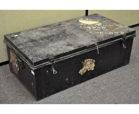 A black painted travelling  trunk, 90cm high x 48cm wide x 31cm deep