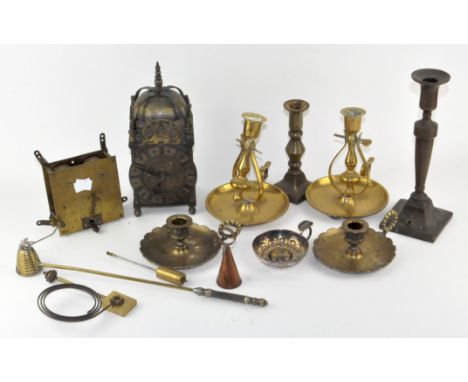 A collection of assorted items, including a brass dome shaped clock, a pair of brass chamber sticks and other items