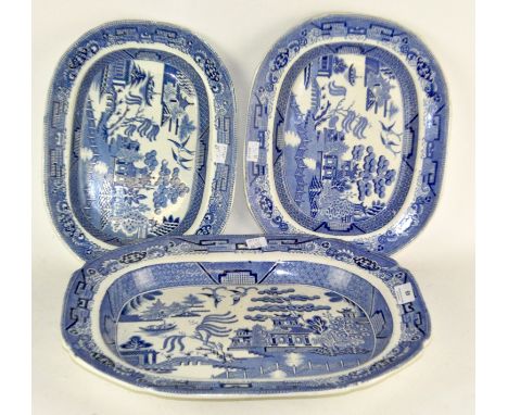 Three blue and white ceramic meat platters, one marked 'Staffordshire Stone china'. largest 44cm wide