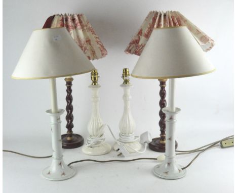 Three pairs of table lamps, to include two ceramic examples and a Regency style resin barley twist pair, 58cm high