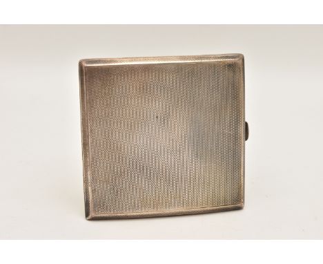 A SILVER CIGERETTE CASE, of a square form, engine turned pattern with push button clasp, worn gilt interior fitted with a sin