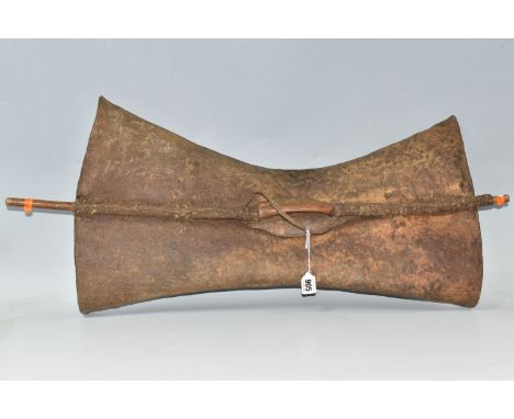 A TURKANA HIDE WAR SHIELD, KENYA of rectangular shape with flared sides, a central pole with handle and leather guard, leathe