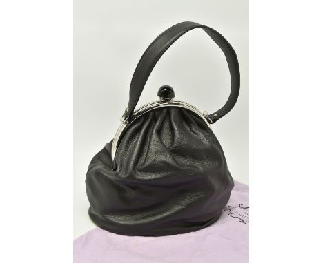 LULU GUINNESS BLACK LEATHER HANDBAG, silver metal hardware, orb shaped Lulu Guinness clasp, Fushia pink suede lined interior,
