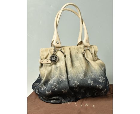 CELINE - PARIS: a faded denim bag with silver tone hardware, cream faux croc handles and Celine dust bag, height 34cm x width