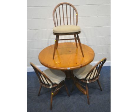 A MODERN PINE CIRCULAR TABLE, raised on a pedestal with four legs, diameter 103cm x height 78cm, along with a set of three st
