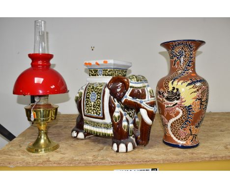 TWO PIECES OF LARGE DECORATIVE CERAMICS, LAMP, AND FRAMED PICTURES, to include an oriental dragon vase, in tan, black, yellow