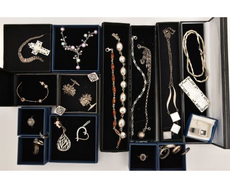 AN ASSORTMENT OF WHITE METAL JEWELLERY, to include five bracelets, seven necklaces, two pairs of cufflinks and assorted rings