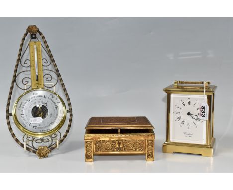 A CARRIAGE CLOCK, BAROMETER AND JEWELLERY BOX, comprising a Woodford solid brass cased carriage clock, height 14cm (some scra