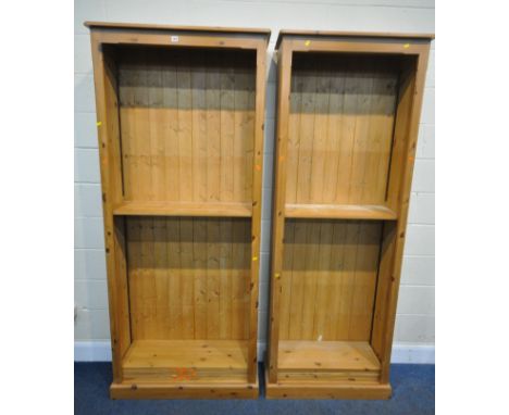 TWO TALL MODERN PINE BOOKCASES, largest width 93cm x depth 33cm x height 218cm, condition report: both with general signs of 
