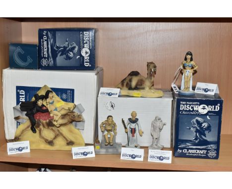 A GROUP OF SIX BOXED CLARECRAFT DISCWORLD 'PYRAMIDS' SCULPTURES comprising a 'You Bastard' DW101, 'Ptraci' DW152 (sticker to 