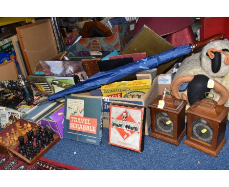 FOUR BOXES AND LOOSE MISCELLANEOUS SUNDRIES, to include vintage board games, Monopoly, Travel Scrabble, a circular Waddington