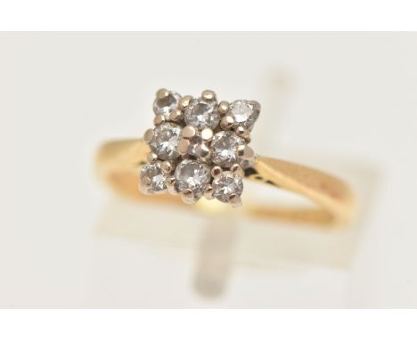 AN 18CT GOLD DIAMOND CLUSTER, of a square form, set with nine small round brilliant cut diamonds, each claw set, pinched shou