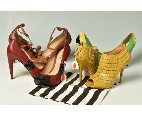 L.A.M.B: four pairs of ladies heels, comprising a black, yellow and green pair of court shoes with detailed white stitching (