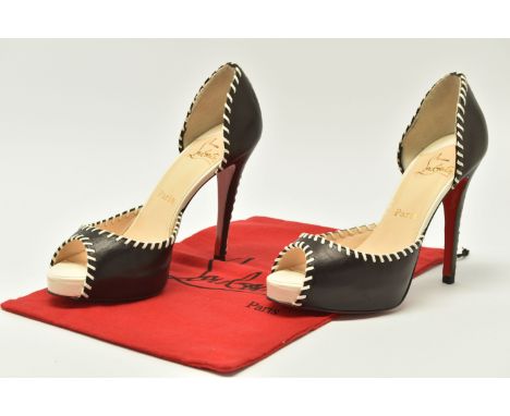 CHRISTIAN LOUBOUTIN: Whipstitch, peep toe 'D'Osay Pumps', black leather with cream/white whipstitch detail, iconic red leathe