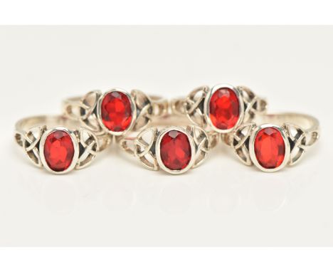 FIVE WHITE METAL GEM SET RINGS, same design set with an oval cut red stone assessed as paste, each stamped 925, ring sizes K,