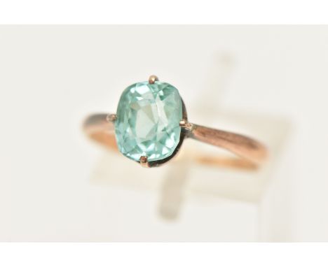 A GEM SET RING, a mixed cut synthetic spinel, prong set in yellow metal, shank stamped 15ct, ring size K, approximate gross w