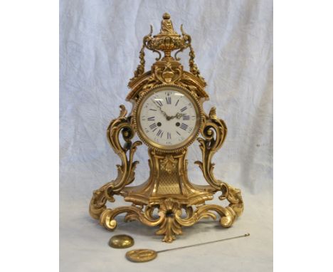 Brass Louis XV style Auboin a Paris mantle clock, porcelain dial, convex bezel, 20-1/4" tall, 20th c