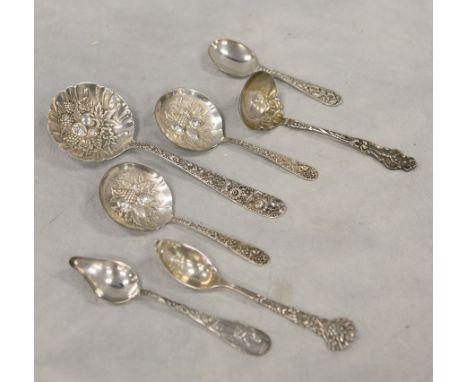 (7) Ornate sterling silver spoons, including (3) S Kirk berry spoons, Stieff floral repousse child's spoon, R Wallace ladle w