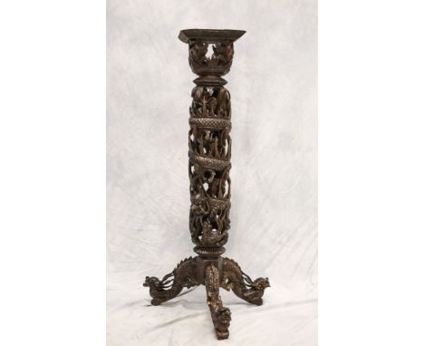 Dragon carved Asian pedestal on tripod base, one leg repaired, 46" h x 9-1/2" square top