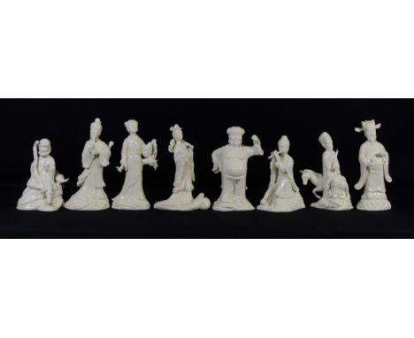 (8) Chinese blanc de chine figures, each with seal marks to rear, minor losses to 2, tallest 9-1/4"