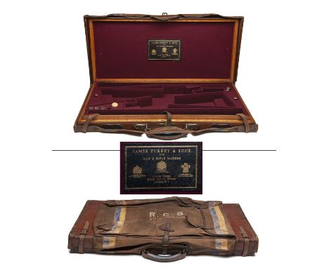 JAMES PURDEY &amp; SONS A BRASS-CORNERED OAK AND LEATHER DOUBLE GUNCASE, fitted for 28in. barrels, the interior lined with ma