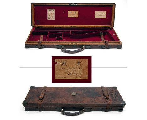 JAMES PURDEY &amp; SONS A BRASS-CORNERED OAK AND LEATHER SINGLE GUNCASE, fitted for 30in. barrels, the interior lined with re