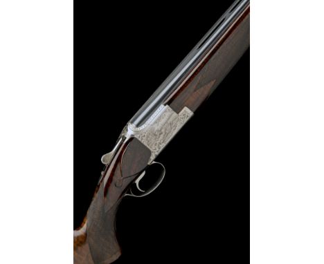 FABRIQUE NATIONALE A 12-BORE 'C2G' SINGLE-TRIGGER OVER AND UNDER EJECTOR, serial no. 52705 S75, 27 5/8in. nitro barrels with 