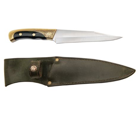 A BRASS AND WOOD-HANDLED FULL TANG HUNTING KNIFE, with 8in. swaged clipped point blade, green wood and brass reinforced handl
