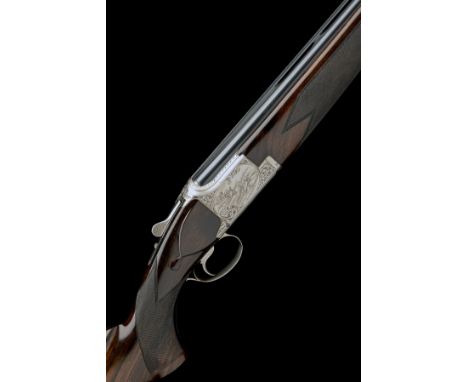 FABRIQUE NATIONALE A 12-BORE 'C2G' SINGLE-TRIGGER OVER AND UNDER EJECTOR, serial no. 8J3RP7167, 30in. nitro barrels with 12mm