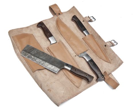 A COMPREHENSIVE SET OF CHEF'S KNIVES CONTAINED WITHIN A LEATHER ROLL, with a full assortment of chef's knives including parin