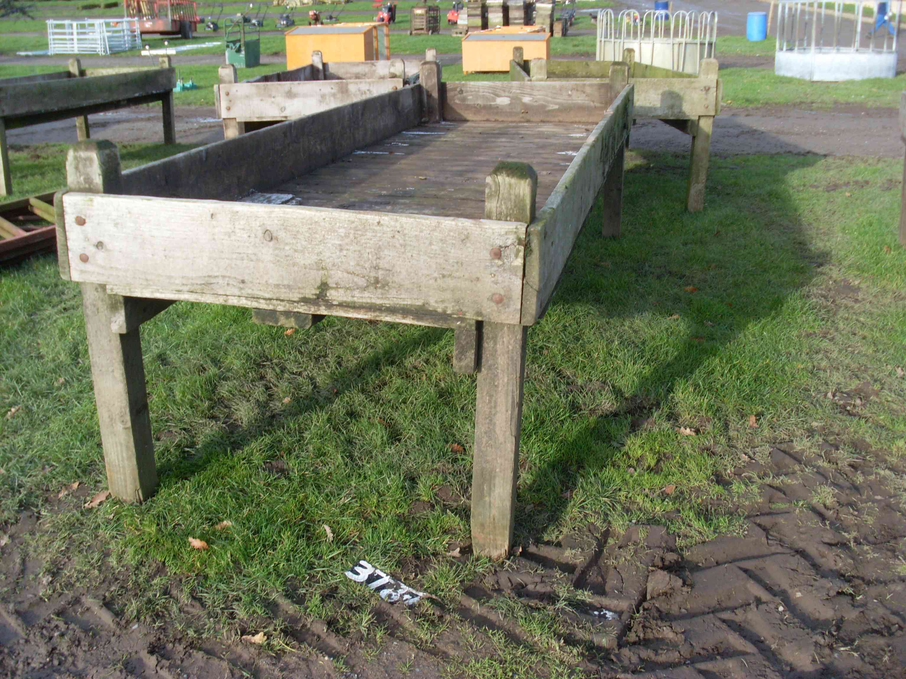 37873793 Wooden cattle feed troughs 12'x4'