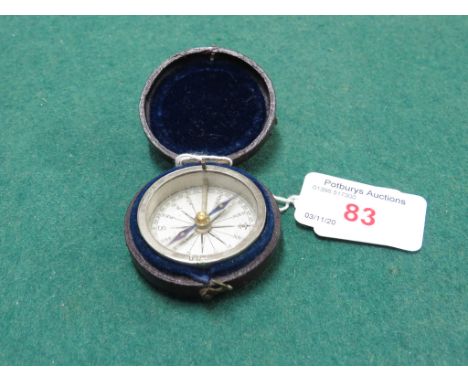 AN EARLY 20TH CENTURY POCKET COMPASS IN LEATHER CASE, THE MOUNT ENGRAVED B &amp; S