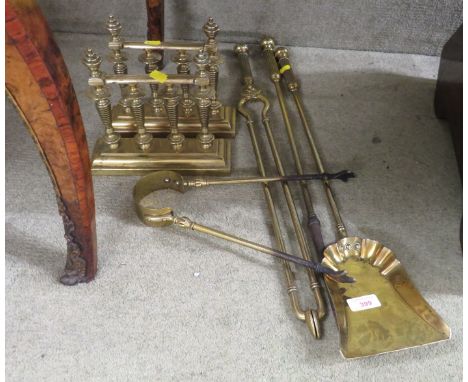 FOUR BRASS FIRE TOOLS AND PAIR OF BRASS STANDS